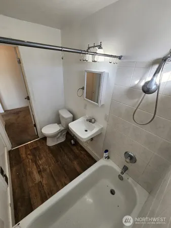 a bathroom with a sink and mirror