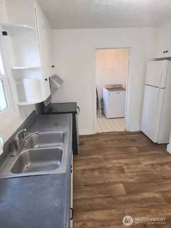 a bathroom with a sink and mirror