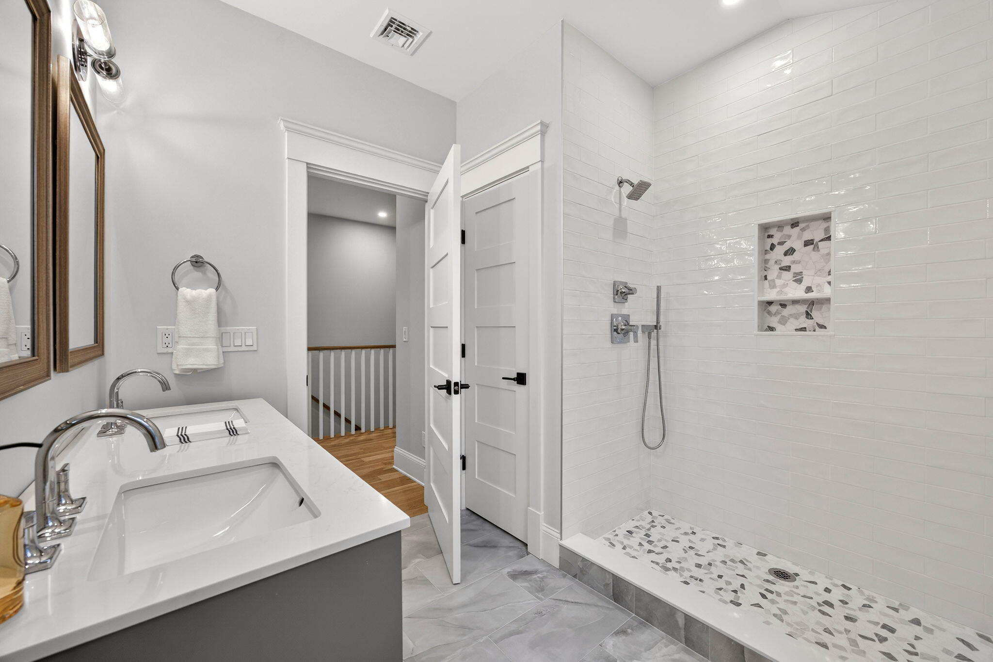 255 Old Main Road, Unit 1B North Falmouth, MA 02556 - Photo 32 of 88 a bathroom with a sink a toilet and shower