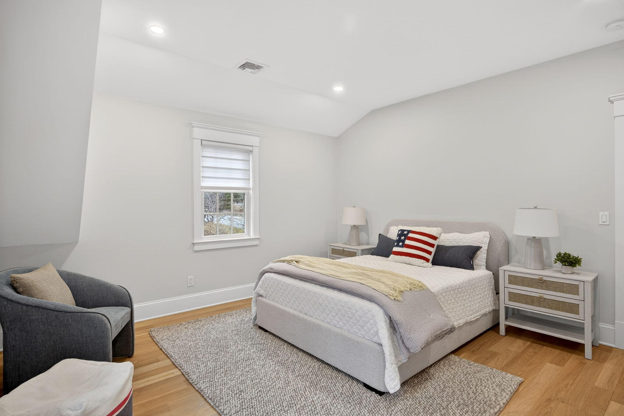 255 Old Main Road, Unit 1B North Falmouth, MA 02556 - Photo 35 of 88 a bedroom with a bed and a couch