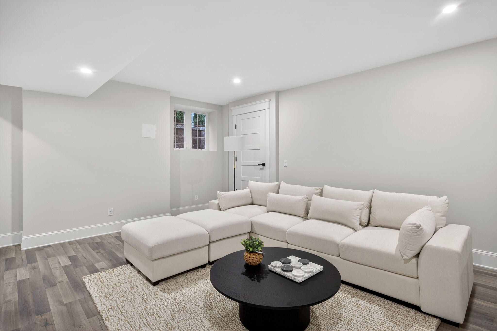255 Old Main Road, Unit 1B North Falmouth, MA 02556 - Photo 42 of 88 a living room with furniture and a wooden floor