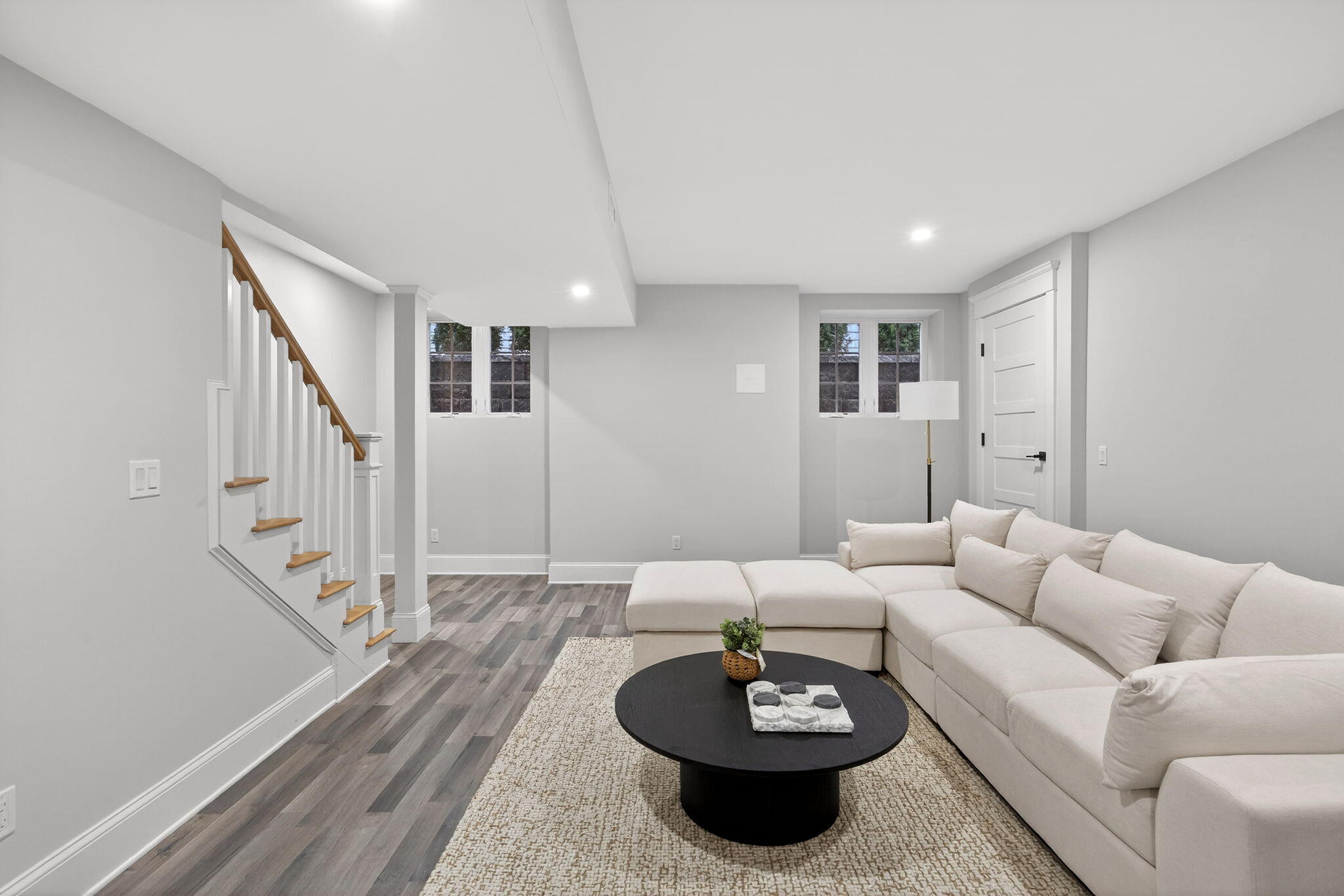 255 Old Main Road, Unit 1B North Falmouth, MA 02556 - Photo 45 of 88 a living room with furniture and a table