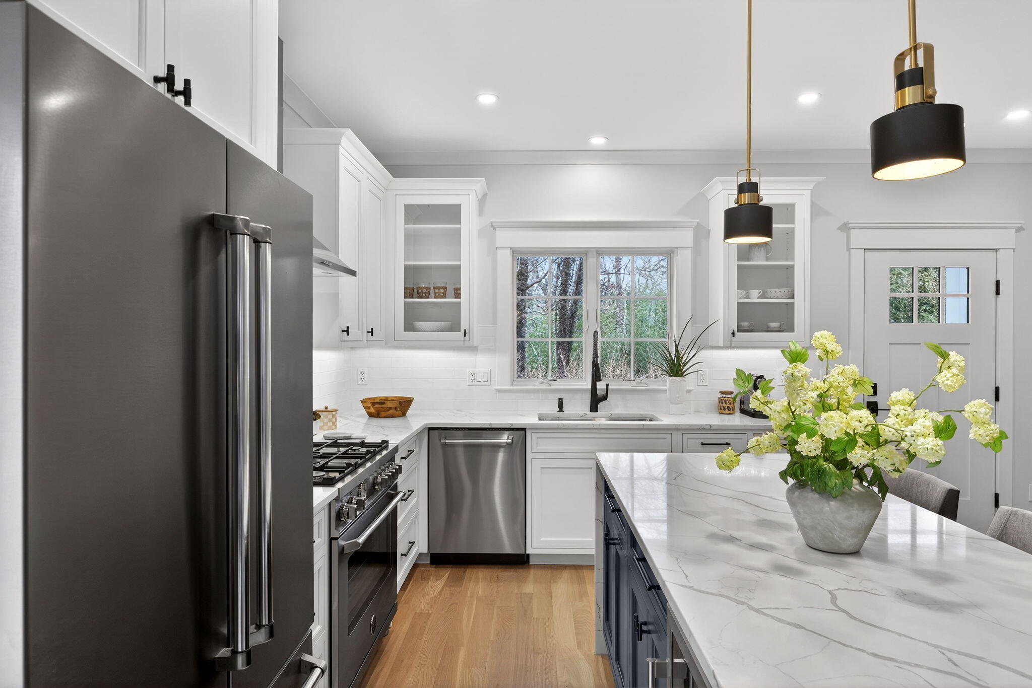 255 Old Main Road, Unit 1B North Falmouth, MA 02556 - Photo 57 of 88 a kitchen with sink refrigerator and window