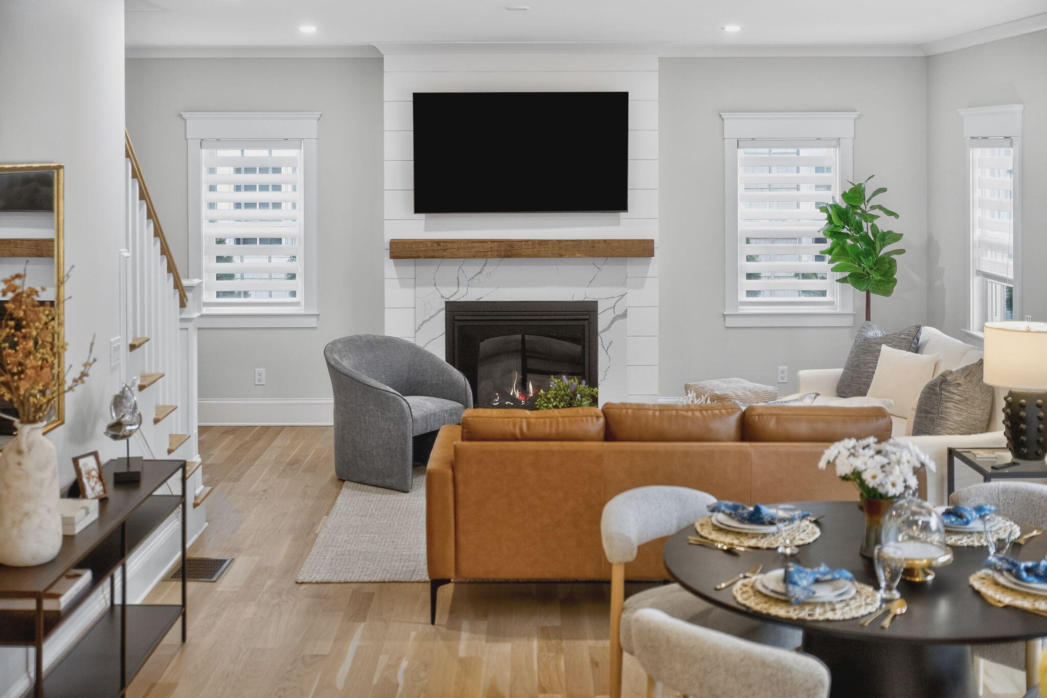 255 Old Main Road, Unit 1B North Falmouth, MA 02556 - Photo 64 of 88 a living room with furniture fireplace and flat screen tv