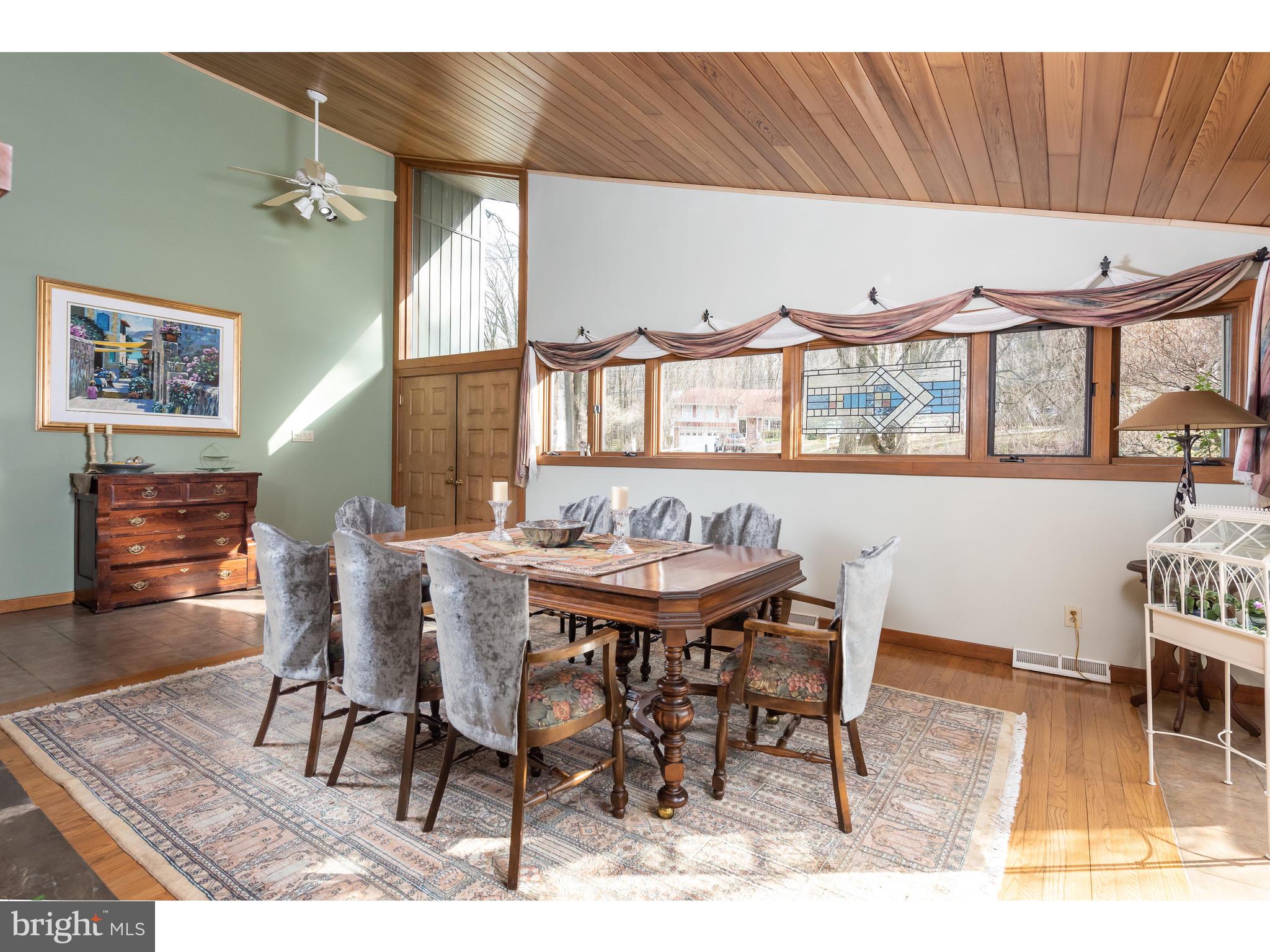 535 Upper Weadley Road Wayne, PA 19087 - Photo 12 of 44 a view of a dining room with furniture and wooden floor