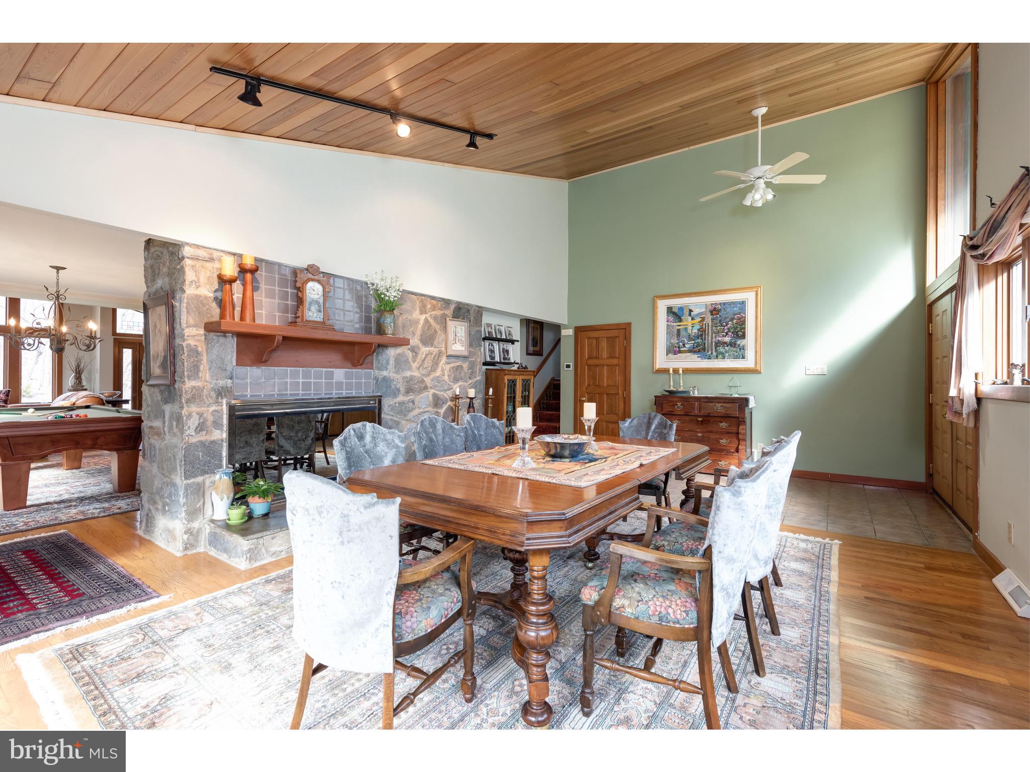535 Upper Weadley Road Wayne, PA 19087 - Photo 13 of 44 a dining room with a wooden table and chairs