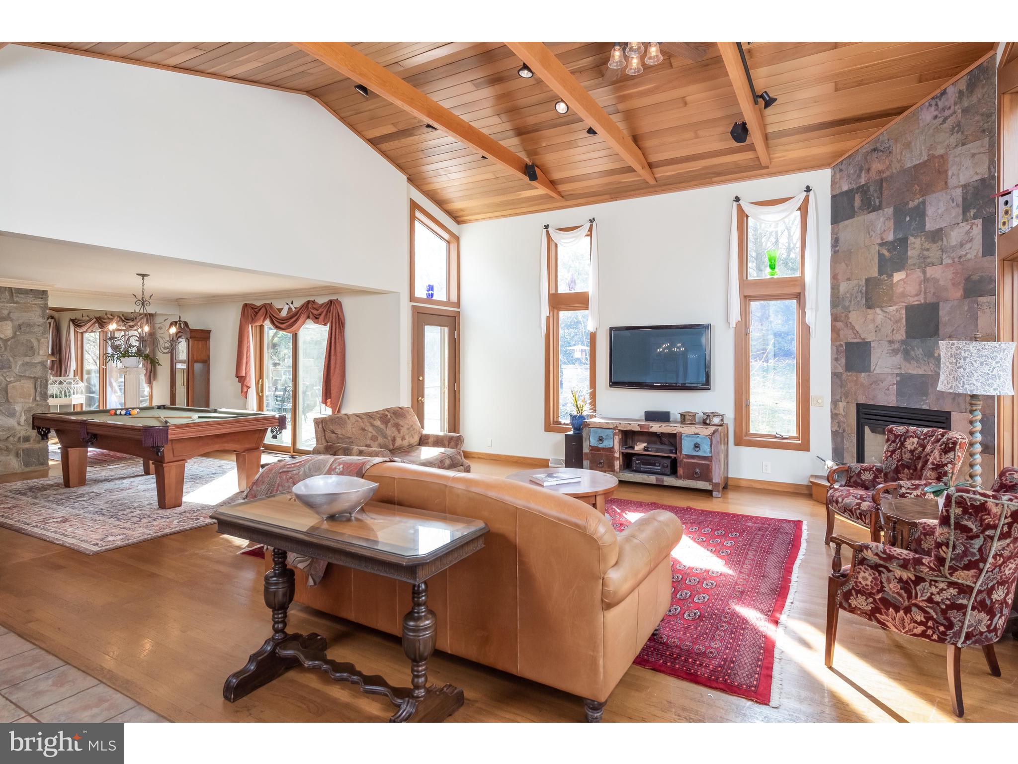 535 Upper Weadley Road Wayne, PA 19087 - Photo 16 of 44 a living room with furniture and large windows