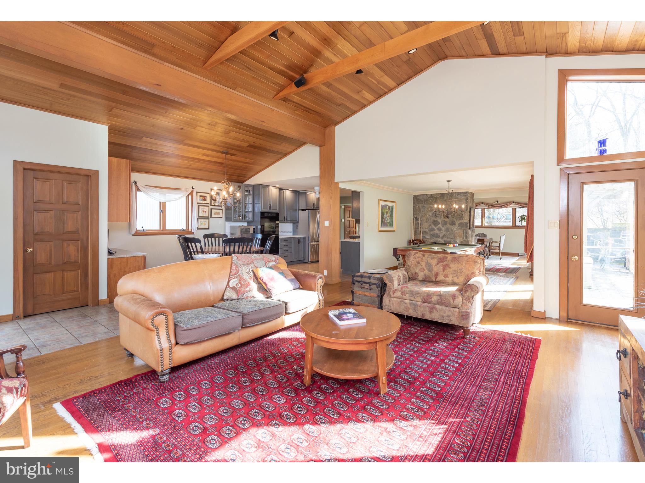 535 Upper Weadley Road Wayne, PA 19087 - Photo 20 of 44 a living room with furniture and a wooden floor