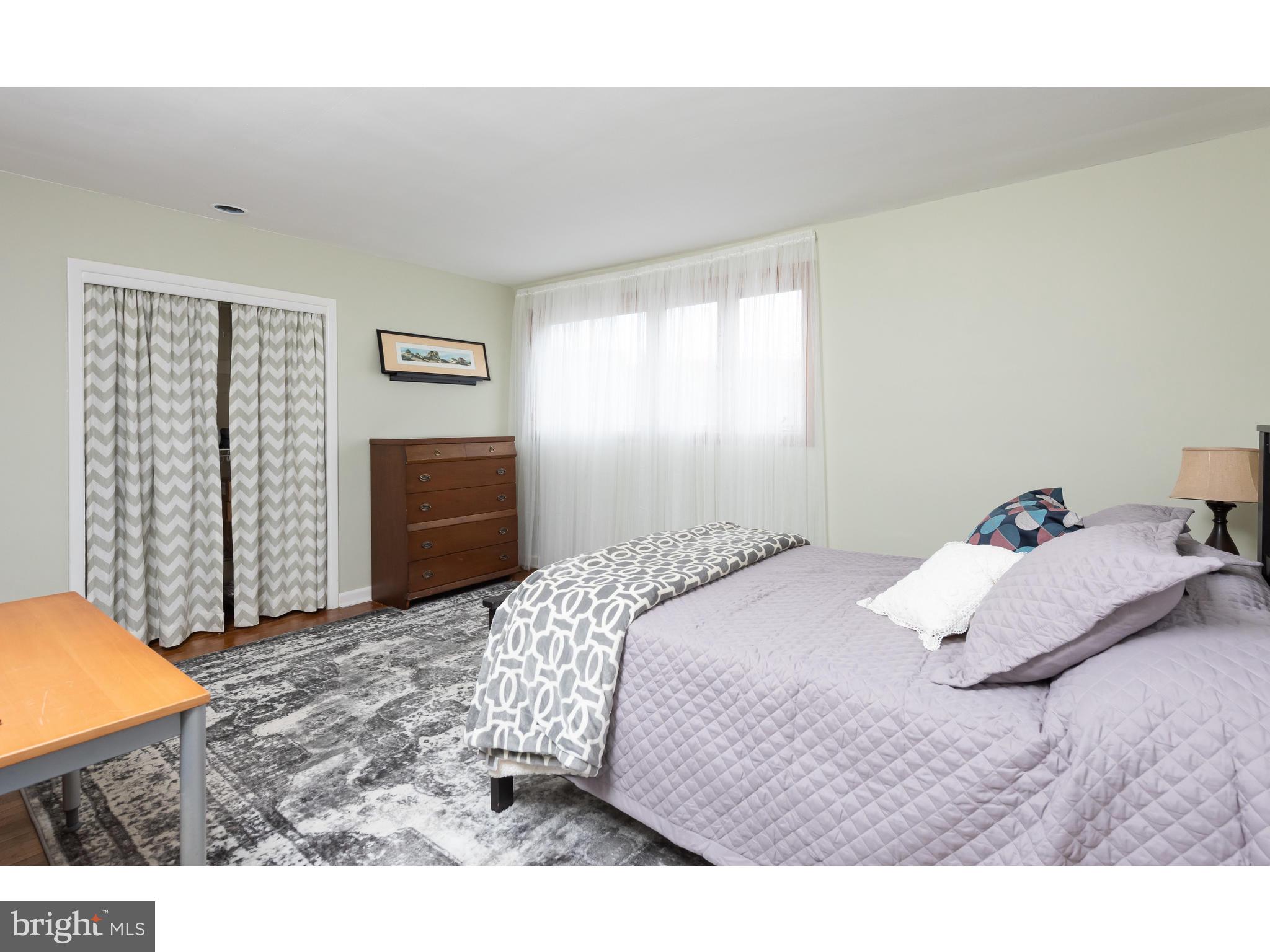 535 Upper Weadley Road Wayne, PA 19087 - Photo 32 of 44 a bedroom with a bed and a cabinets