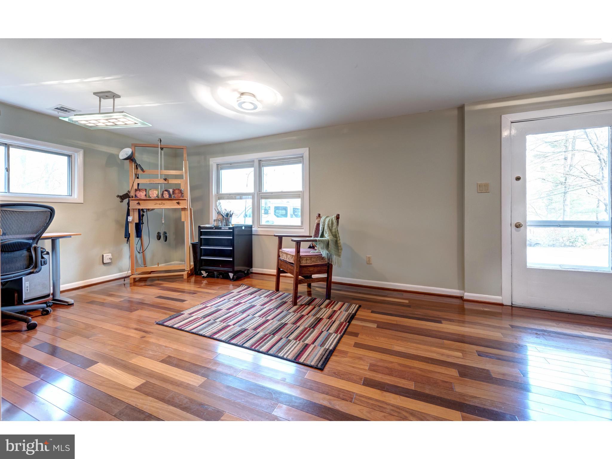 535 Upper Weadley Road Wayne, PA 19087 - Photo 36 of 44 a living room with furniture and a wooden floor