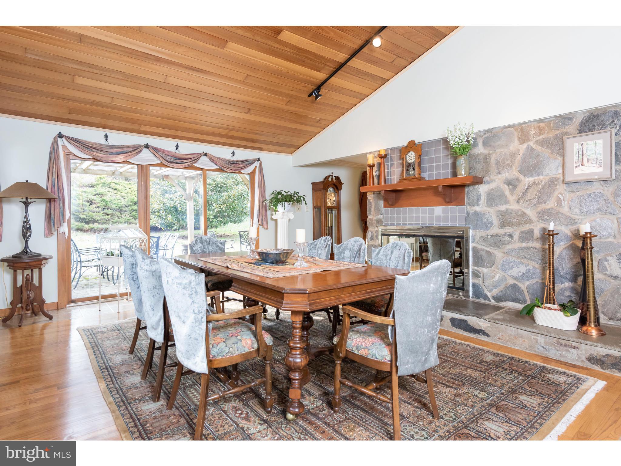 535 Upper Weadley Road Wayne, PA 19087 - Photo 10 of 44 a dining room with furniture and wooden floor