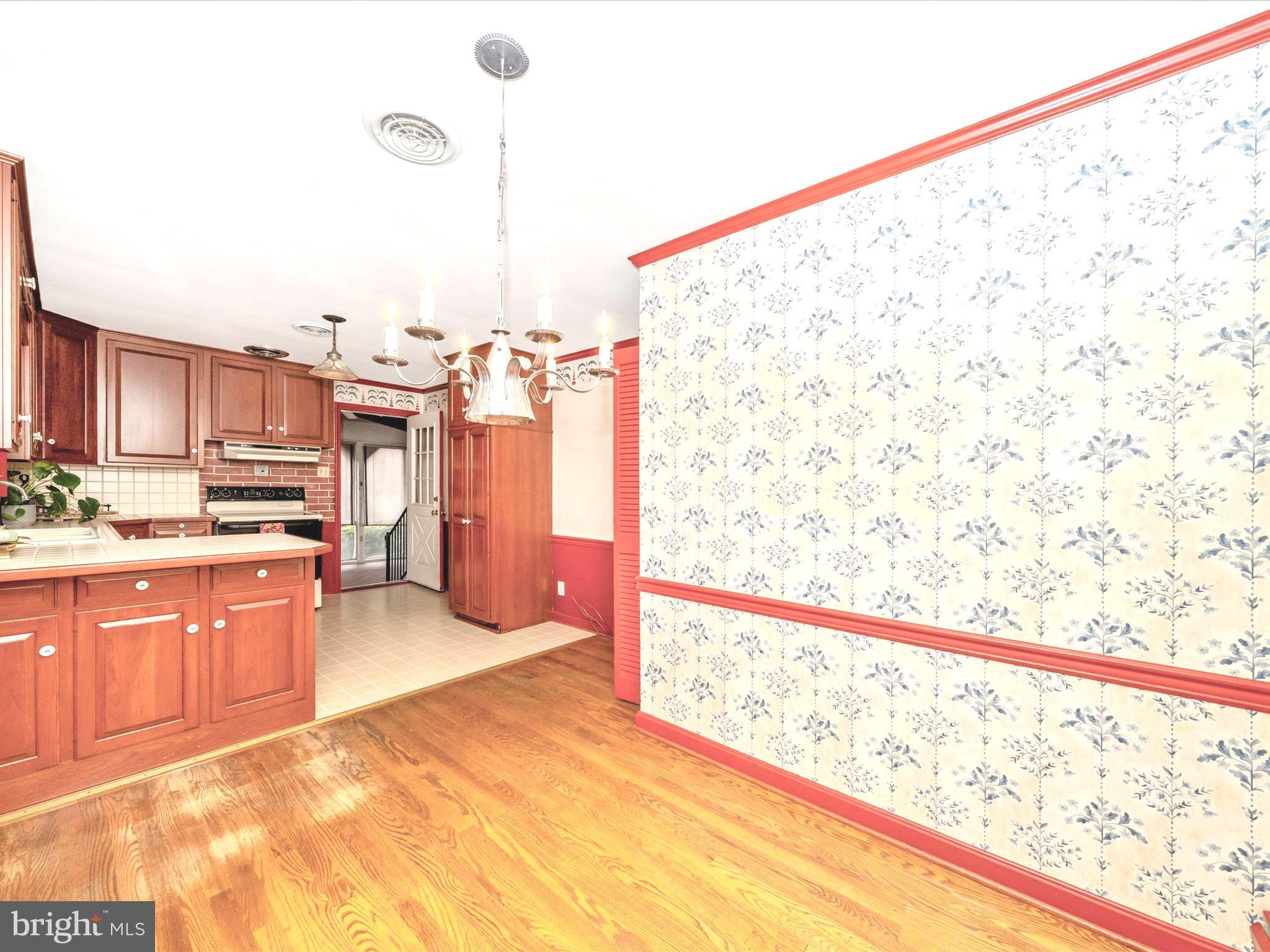 17920 Pin Oak Road Hagerstown, MD 21740 - Photo 15 of 57 a view of kitchen with cabinets and wooden floor