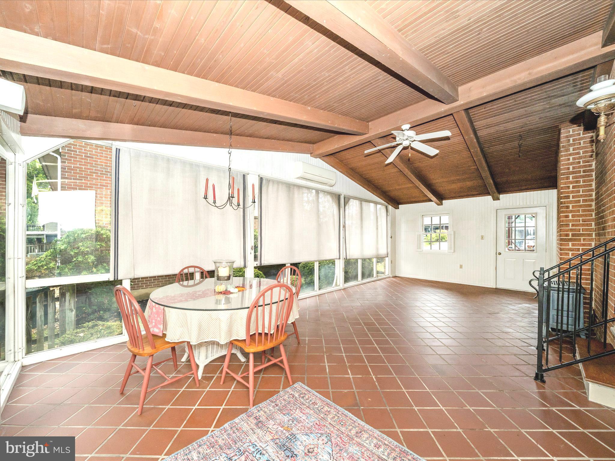 17920 Pin Oak Road Hagerstown, MD 21740 - Photo 17 of 57 a dining room with furniture and a large window