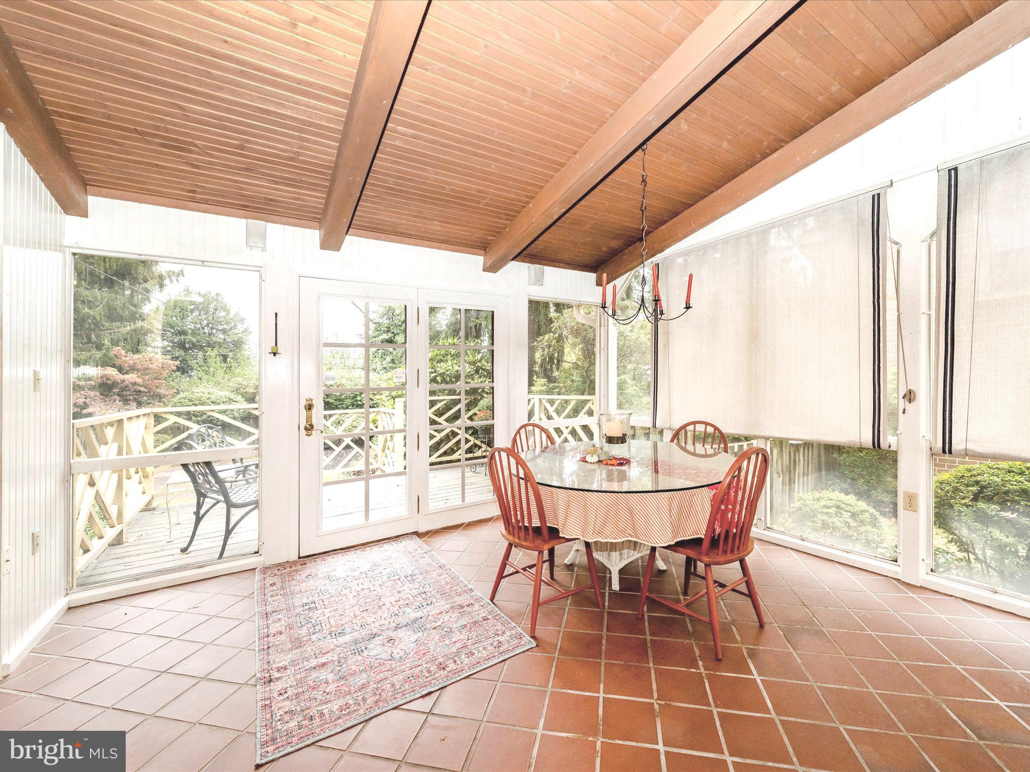 17920 Pin Oak Road Hagerstown, MD 21740 - Photo 21 of 57 a dining room with furniture and large windows