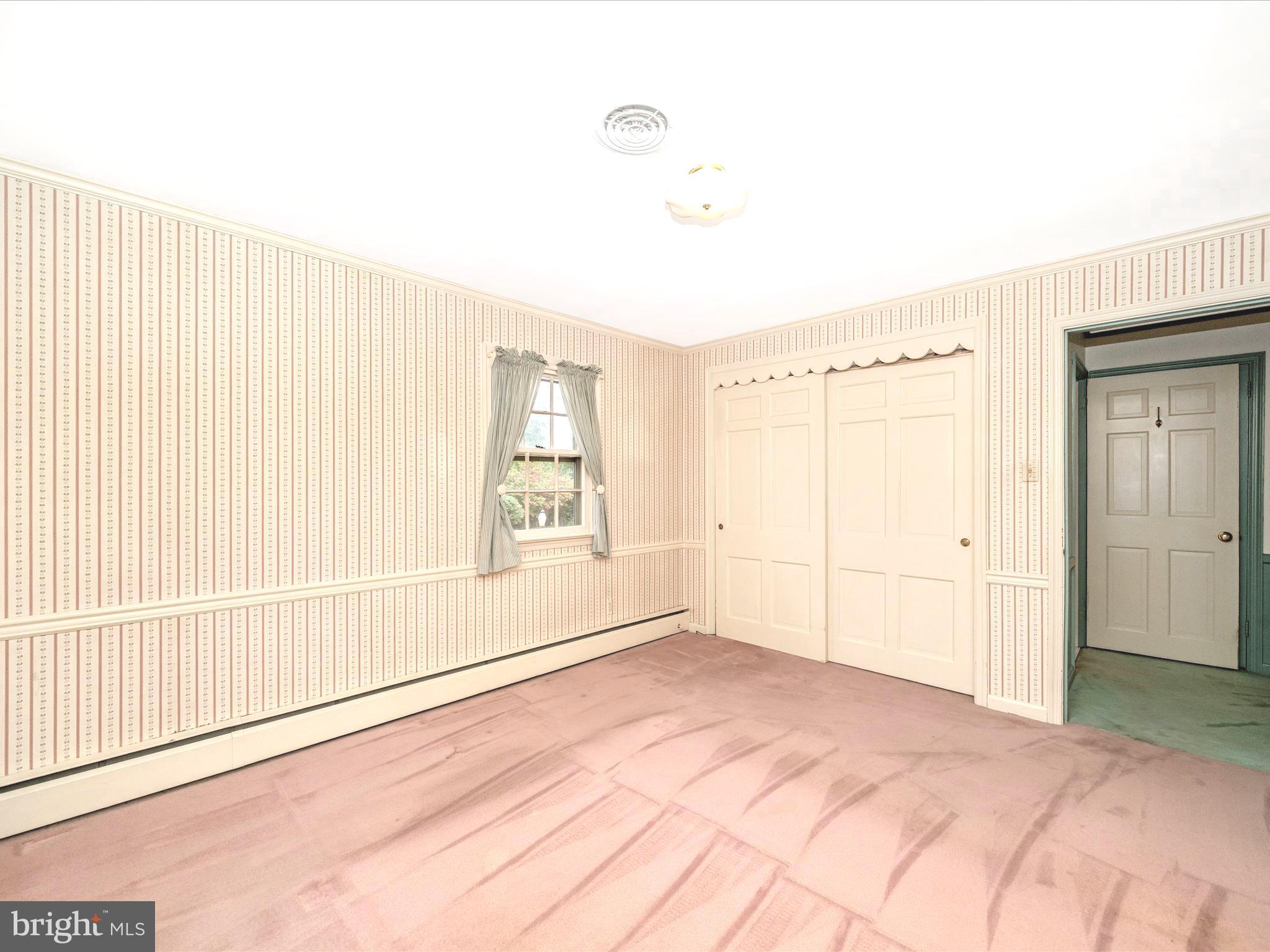 17920 Pin Oak Road Hagerstown, MD 21740 - Photo 24 of 57 a view of an empty room with a window