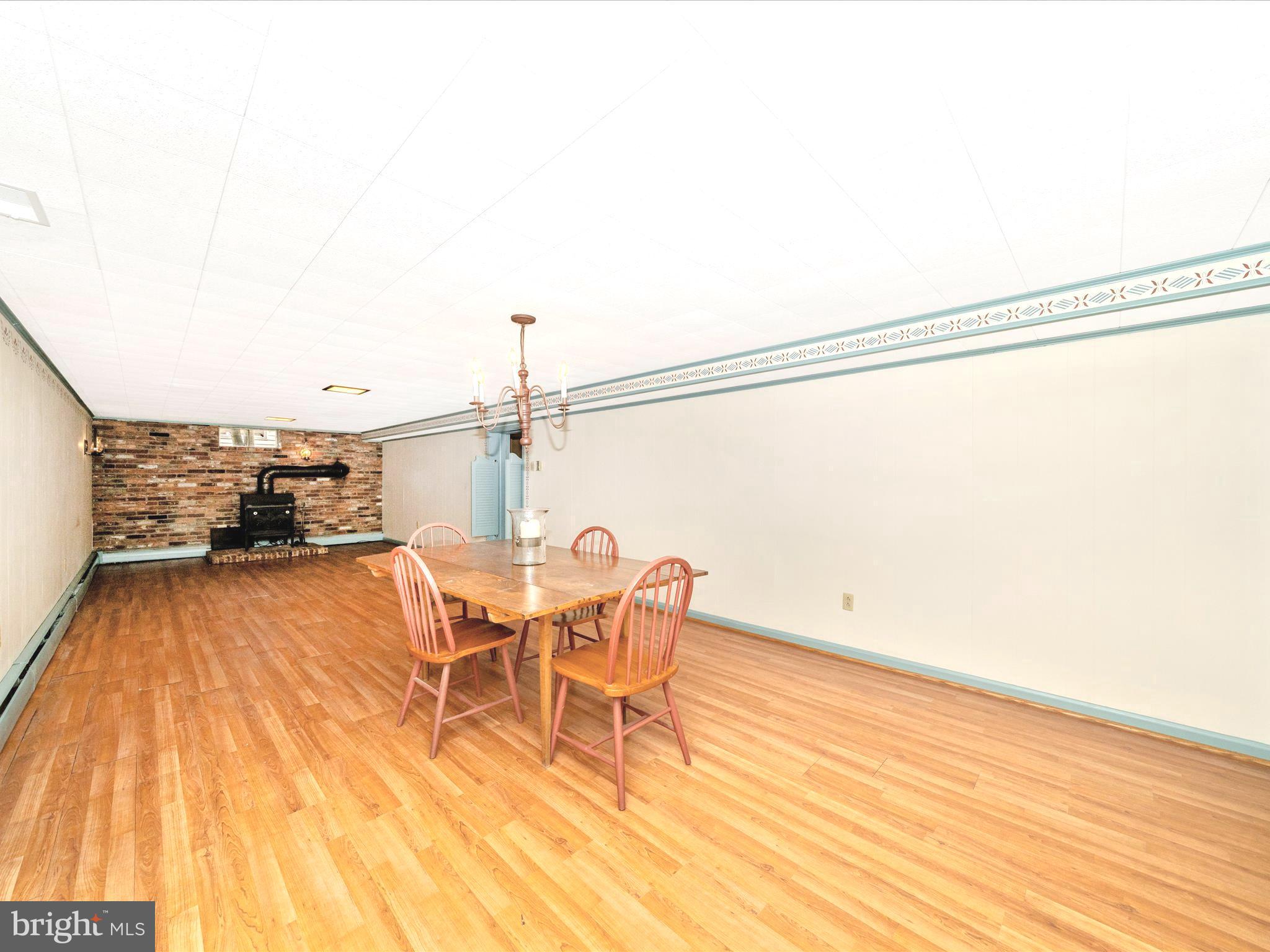 17920 Pin Oak Road Hagerstown, MD 21740 - Photo 34 of 57 a view of a room with furniture and wooden floor