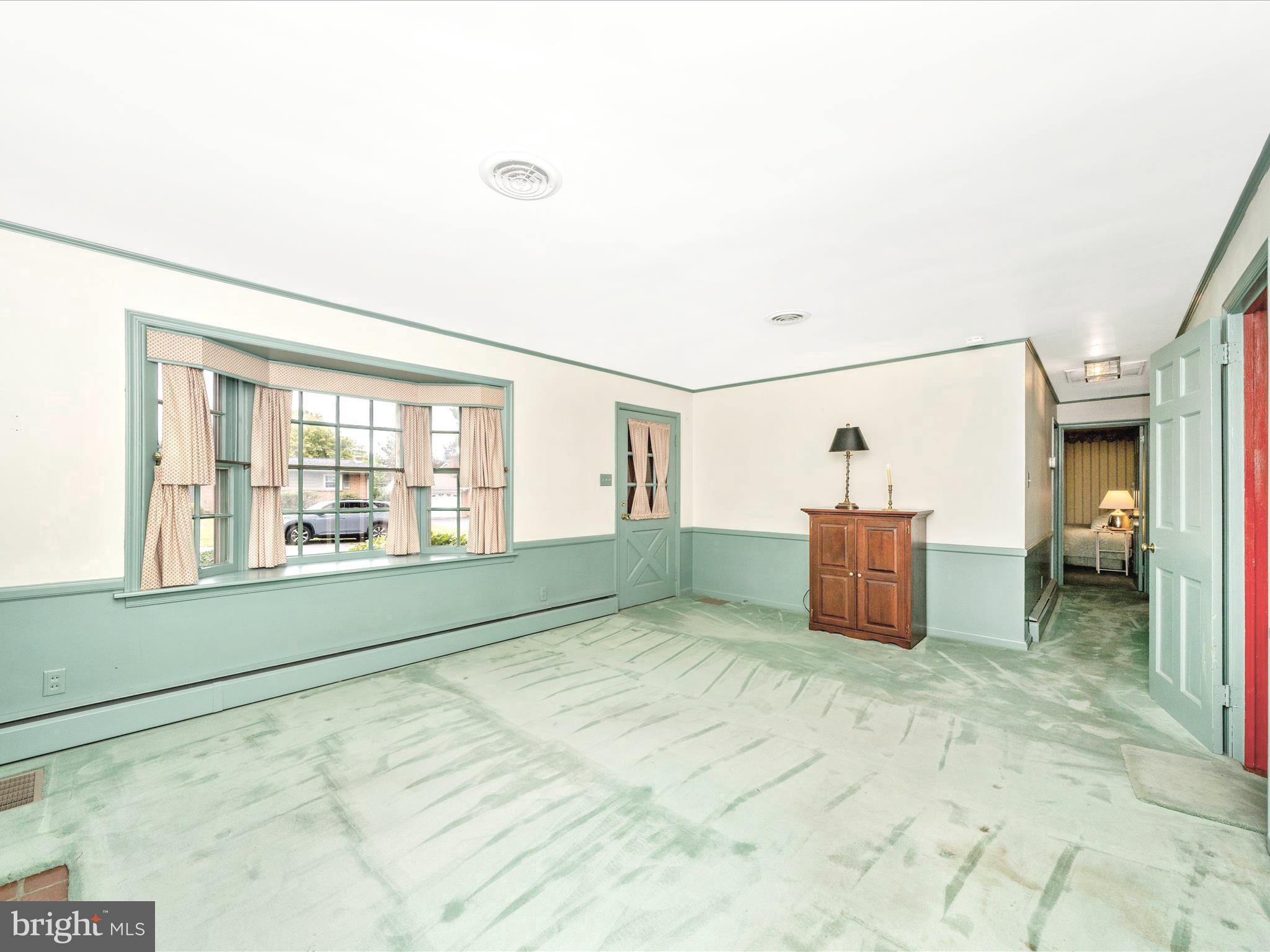 17920 Pin Oak Road Hagerstown, MD 21740 - Photo 5 of 57 a view of an empty room with a window