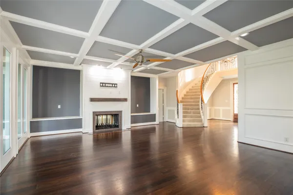 a view of entryway with wooden floor and a rug