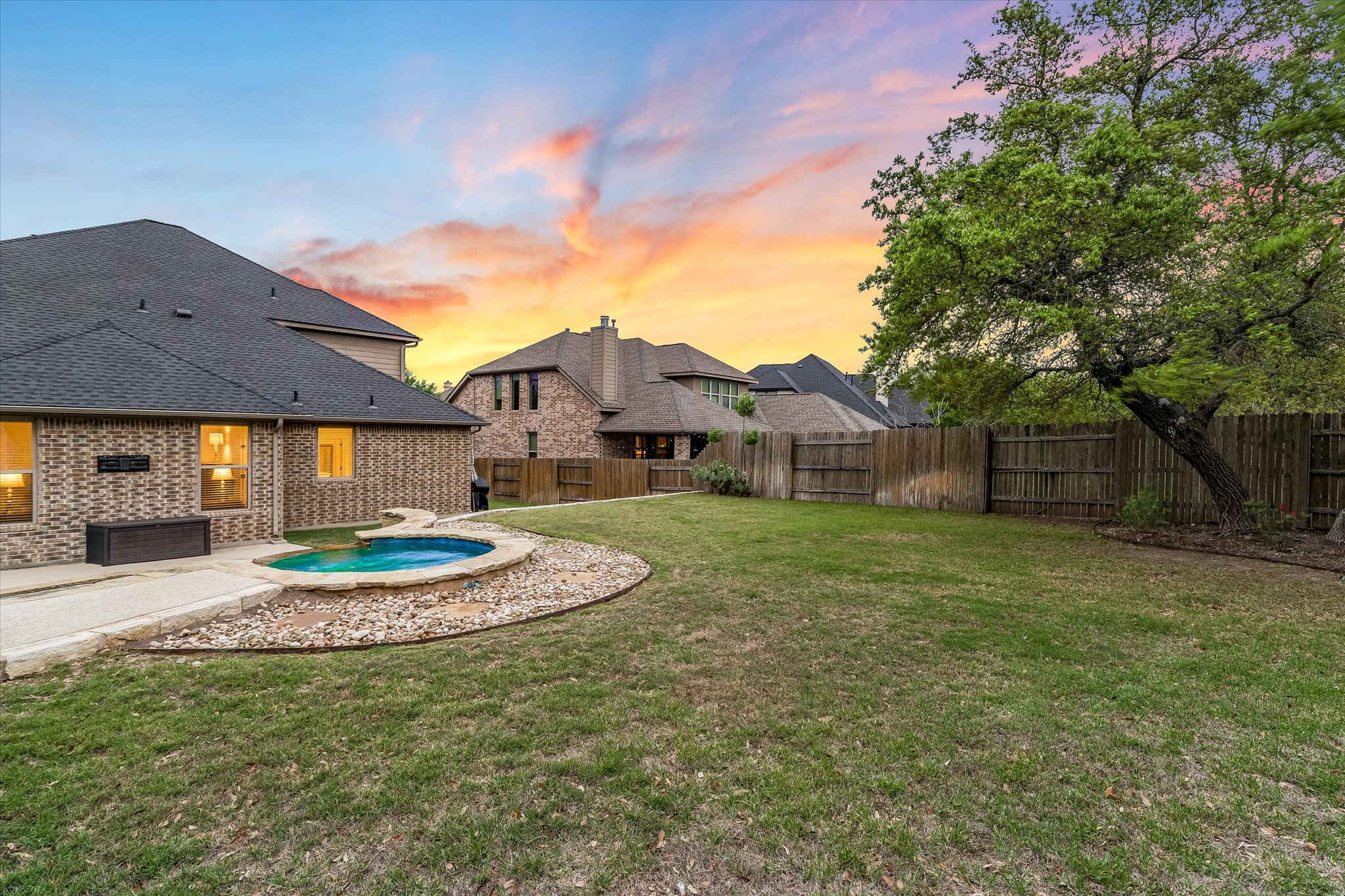 226 Galloway Lane Austin, TX 78737 - Photo 28 of 30 Fenced backyard with a patio