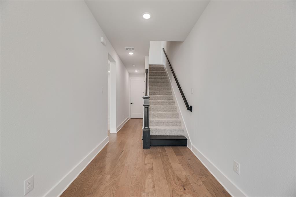 817 Ash Road Plano, TX 75075 - Photo 11 of 23 a view of entryway with wooden floor