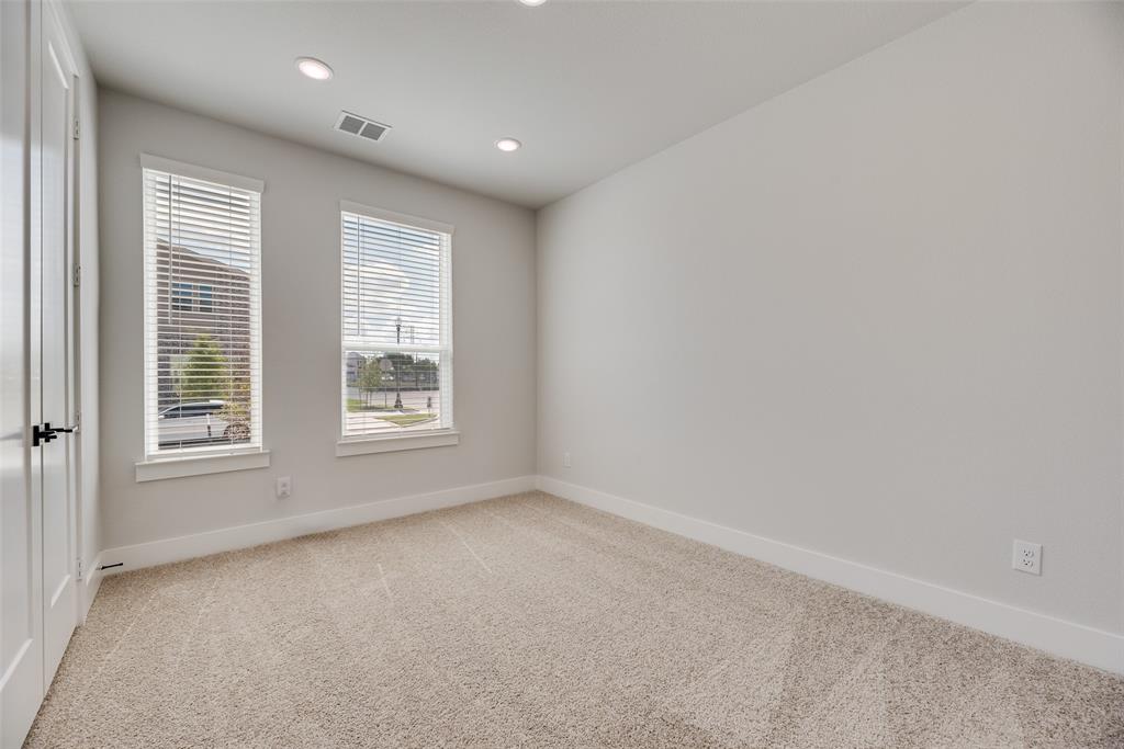 817 Ash Road Plano, TX 75075 - Photo 12 of 23 an empty room with windows