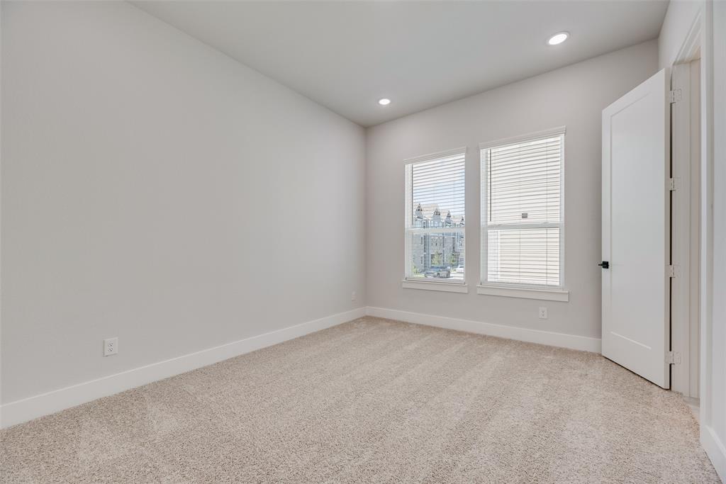 817 Ash Road Plano, TX 75075 - Photo 20 of 23 a view of an empty room with a window