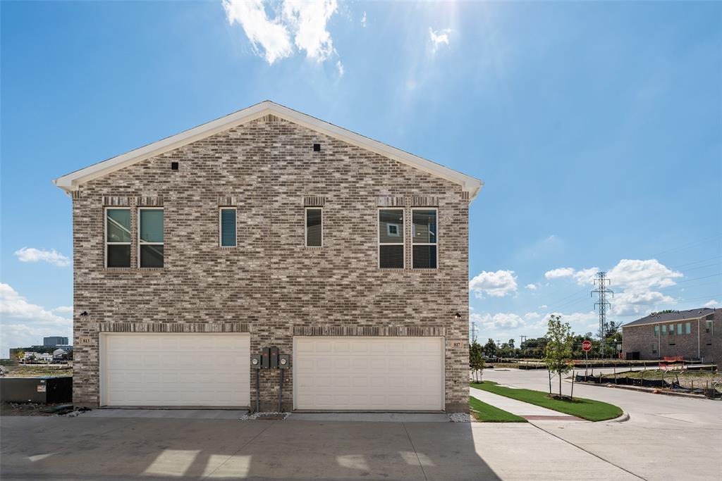 817 Ash Road Plano, TX 75075 - Photo 22 of 23 a front view of a house with a yard