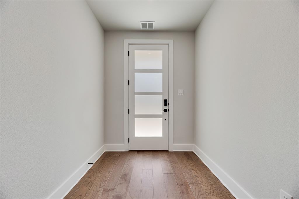 817 Ash Road Plano, TX 75075 - Photo 9 of 23 a view of an empty room with a window