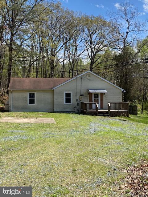 794 Telegraph Road Stafford, VA 22554 - Photo 9 of 21 a front view of house with yard and trees in the background