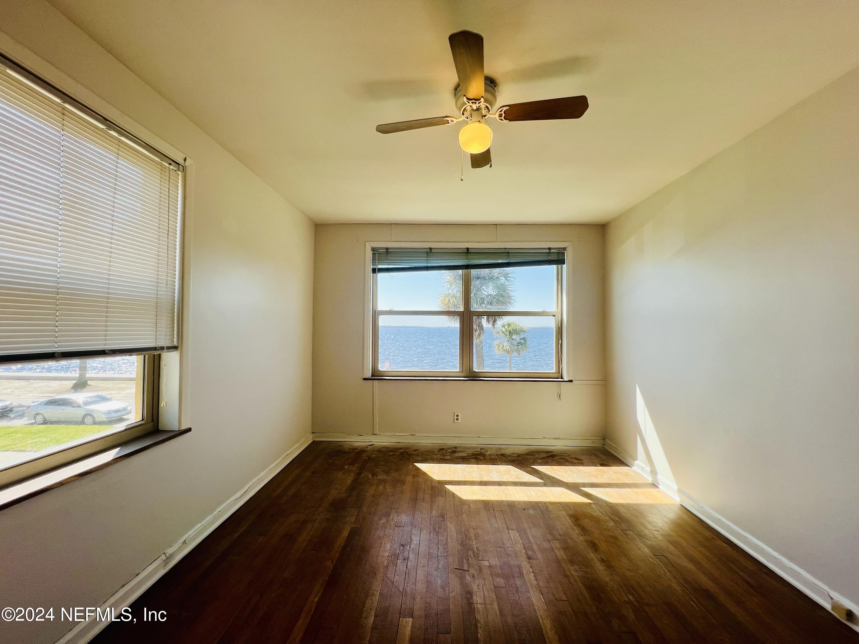 1781 River Road, Unit 4 Jacksonville, FL 32207 - Photo 14 of 24 a view of empty room with wooden floor and fan