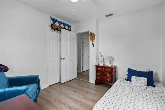 a bedroom with a bed and furniture