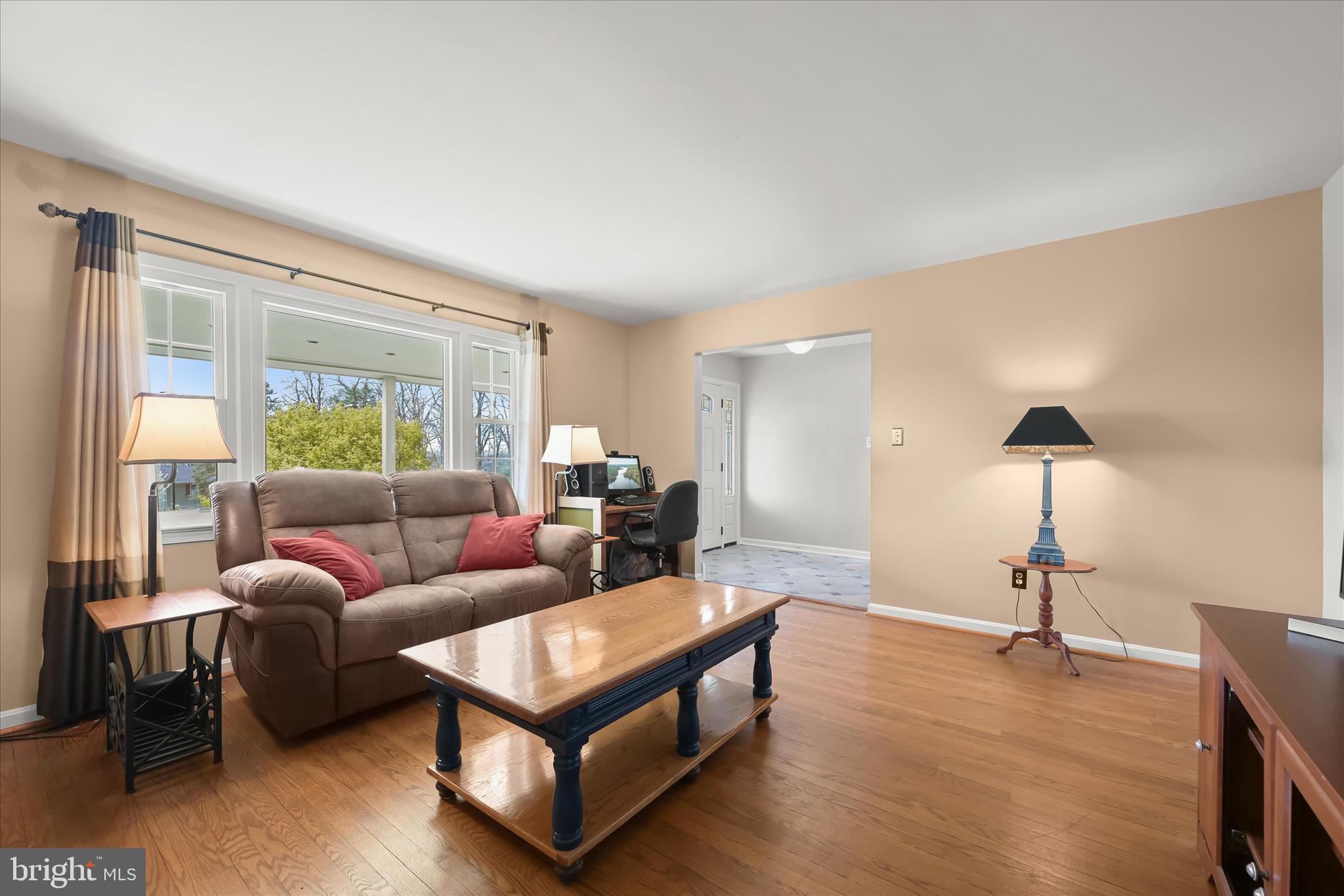 14821 Ridge Oak Drive Boyds, MD 20841 - Photo 10 of 49 a living room with furniture and a wooden floor