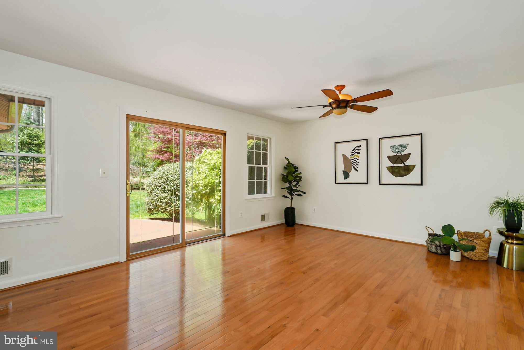 7417 Miller Fall Road Derwood, MD 20855 - Photo 13 of 38 Upper level living room w/sliders to terrace
