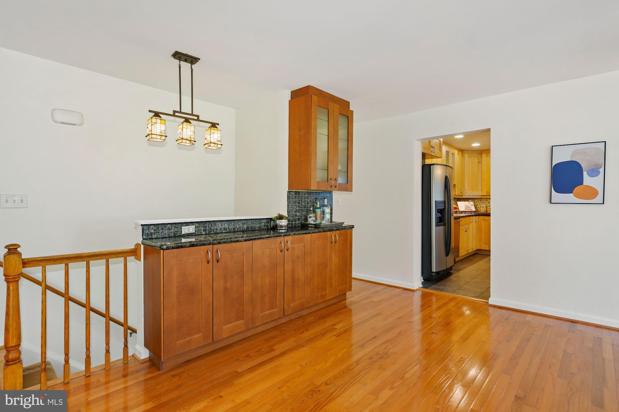 7417 Miller Fall Road Derwood, MD 20855 - Photo 15 of 38 Dining room w/built-in buffet & cabinetry
