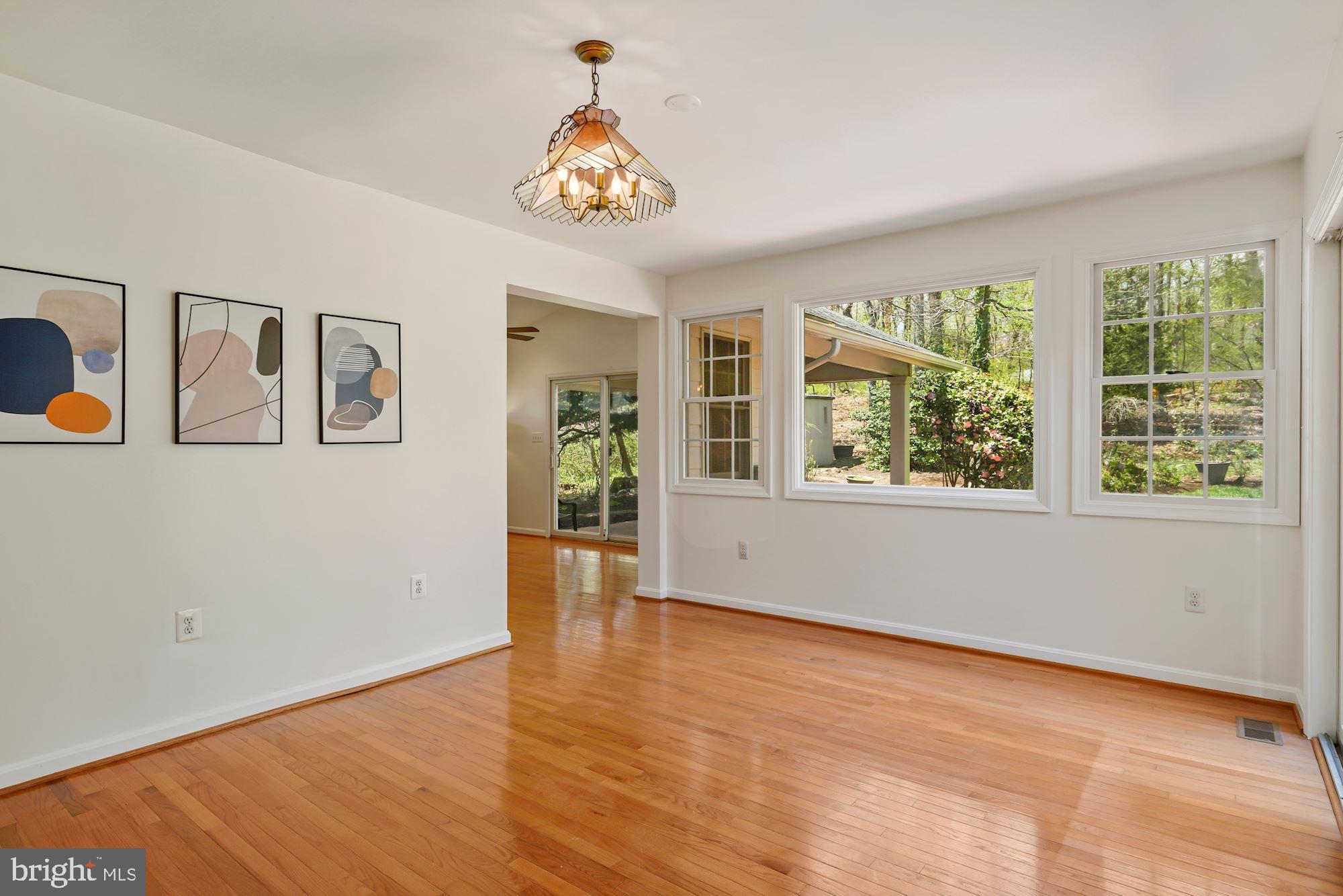 7417 Miller Fall Road Derwood, MD 20855 - Photo 16 of 38 Dining room with wall of windows