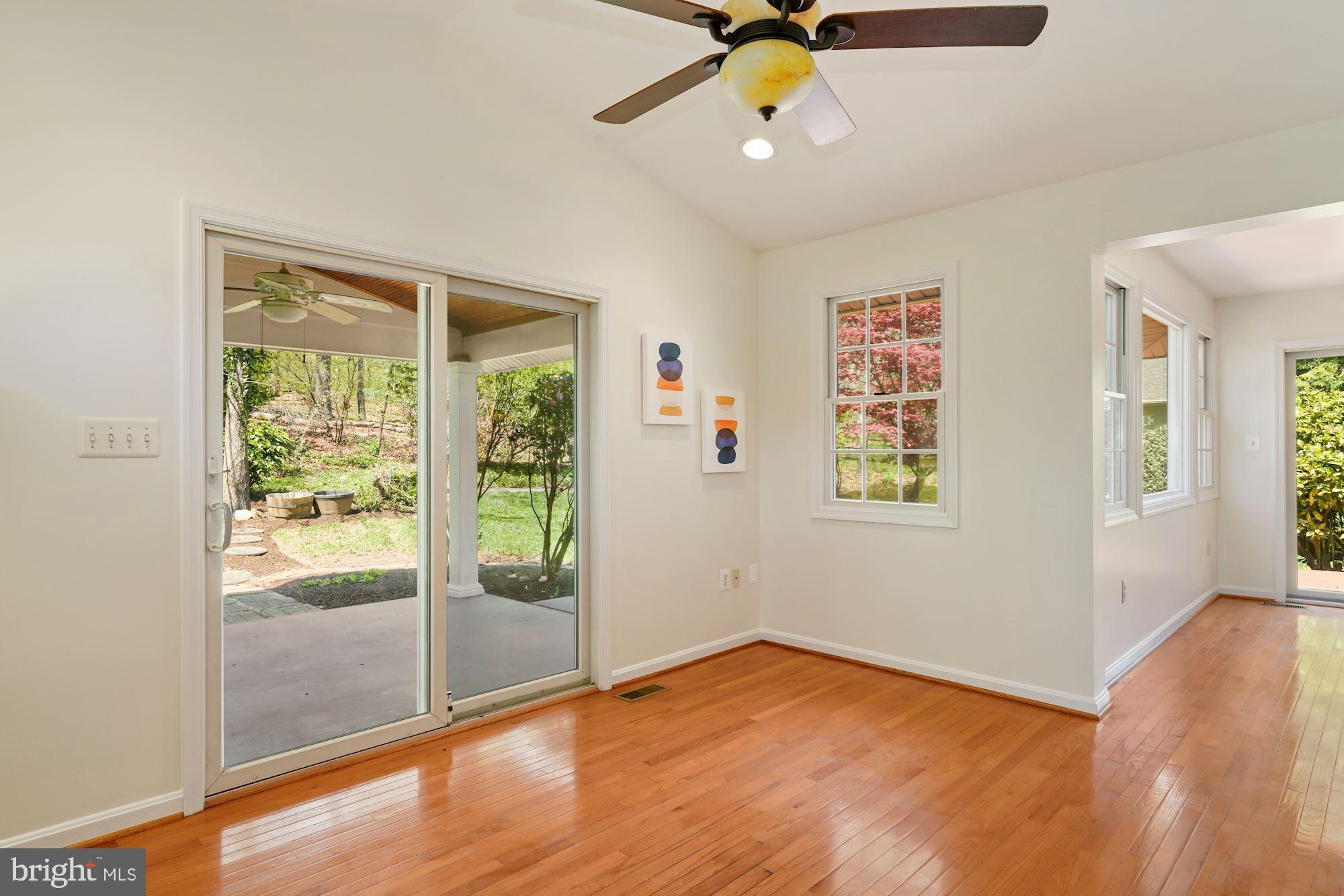 7417 Miller Fall Road Derwood, MD 20855 - Photo 24 of 38 Family room w/sliders to covered porch