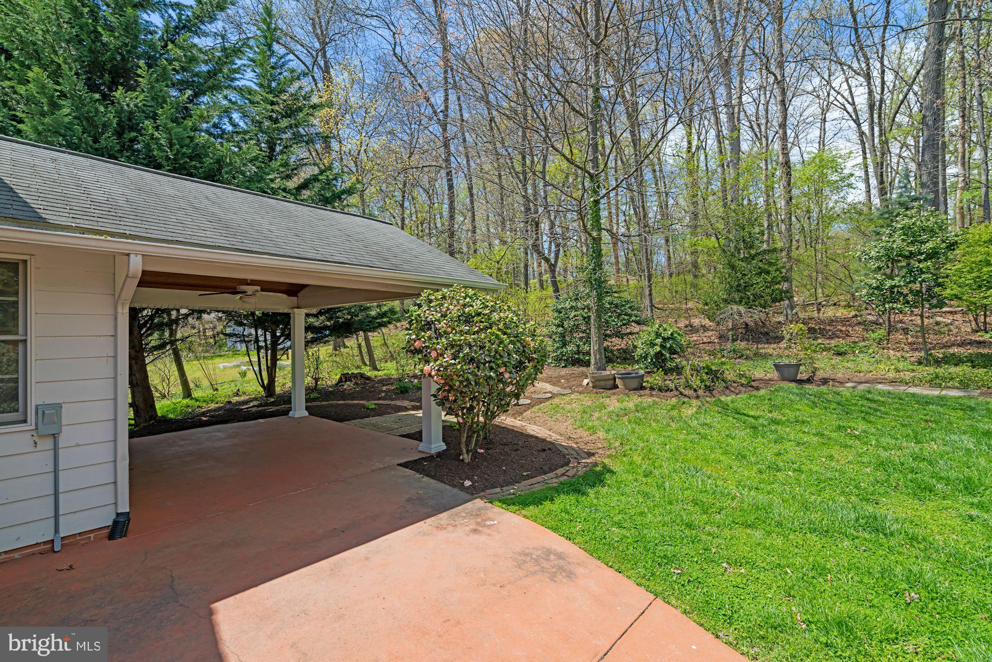 7417 Miller Fall Road Derwood, MD 20855 - Photo 34 of 38 Backyard terrace overlooking backyard