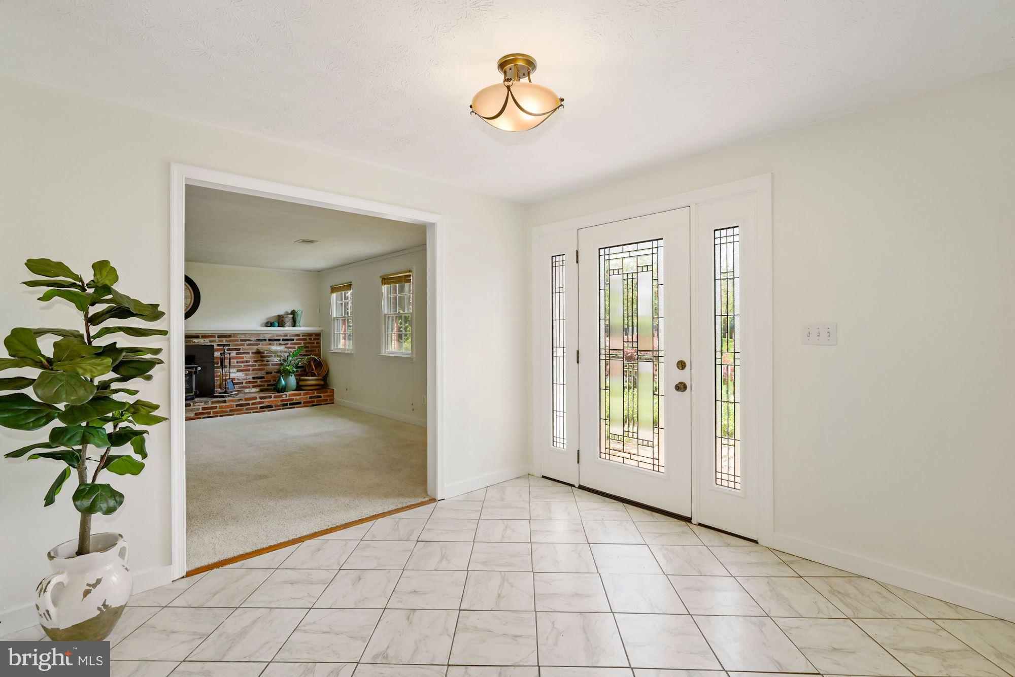 7417 Miller Fall Road Derwood, MD 20855 - Photo 4 of 38 Welcoming foyer entry w/ceramic tiled floors