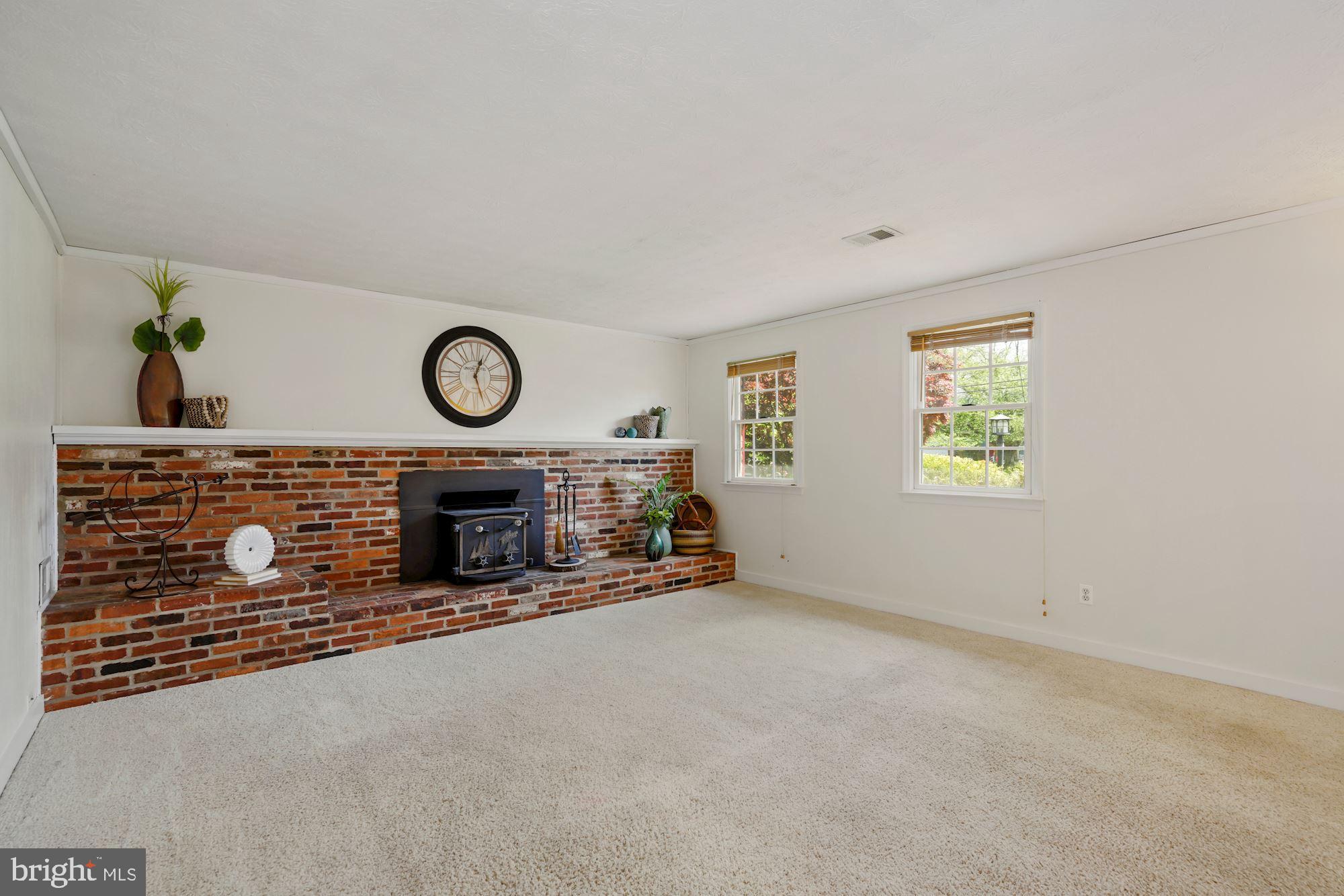 7417 Miller Fall Road Derwood, MD 20855 - Photo 6 of 38 15'X18' Recreation room w/fireplace