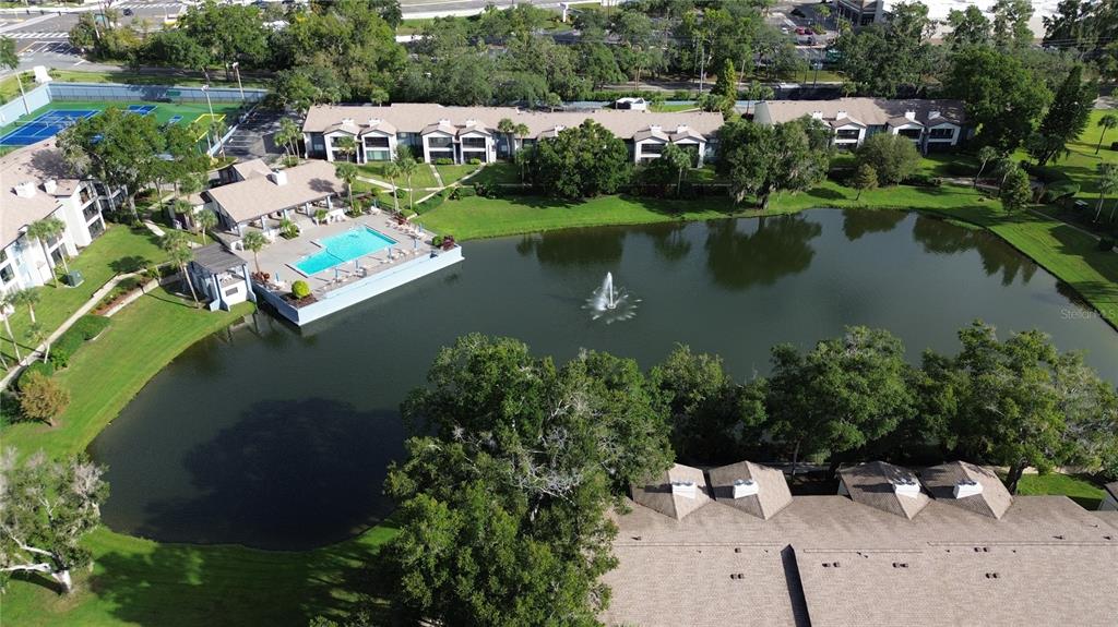 3 Escondido Circle, Unit 8 Altamonte Springs, FL 32701 - Photo 13 of 29 an aerial view of a house with a yard and lake view