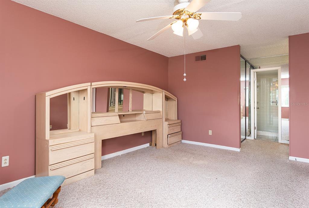 3 Escondido Circle, Unit 8 Altamonte Springs, FL 32701 - Photo 16 of 29 a view of an empty room with a window