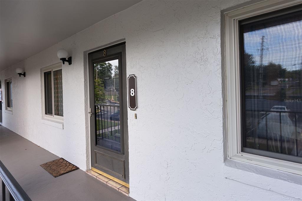 3 Escondido Circle, Unit 8 Altamonte Springs, FL 32701 - Photo 2 of 29 a view of a door and a window