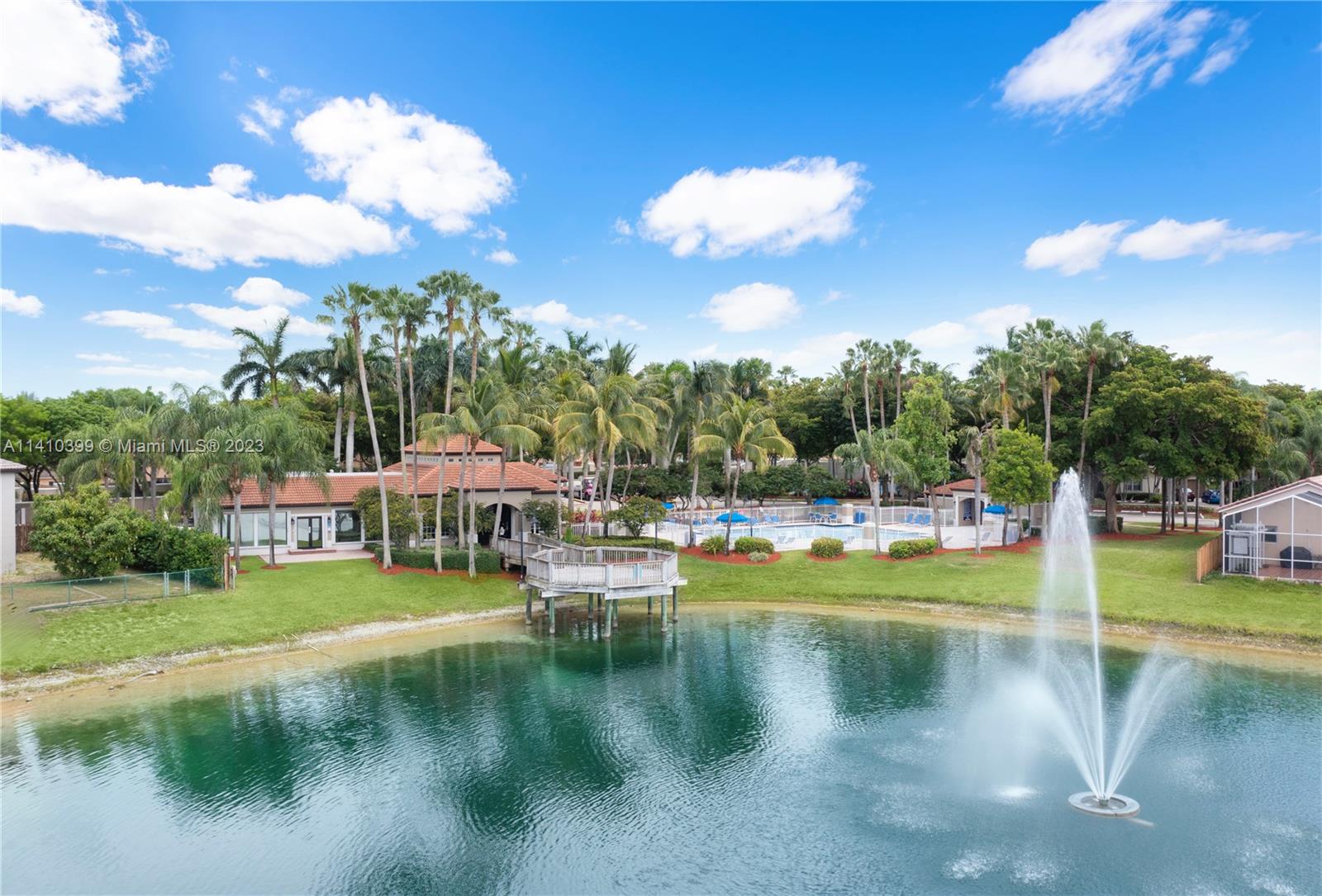 12030 Southwest 135th Terrace Miami, FL 33186 - Photo 20 of 27 a view of a lake with houses