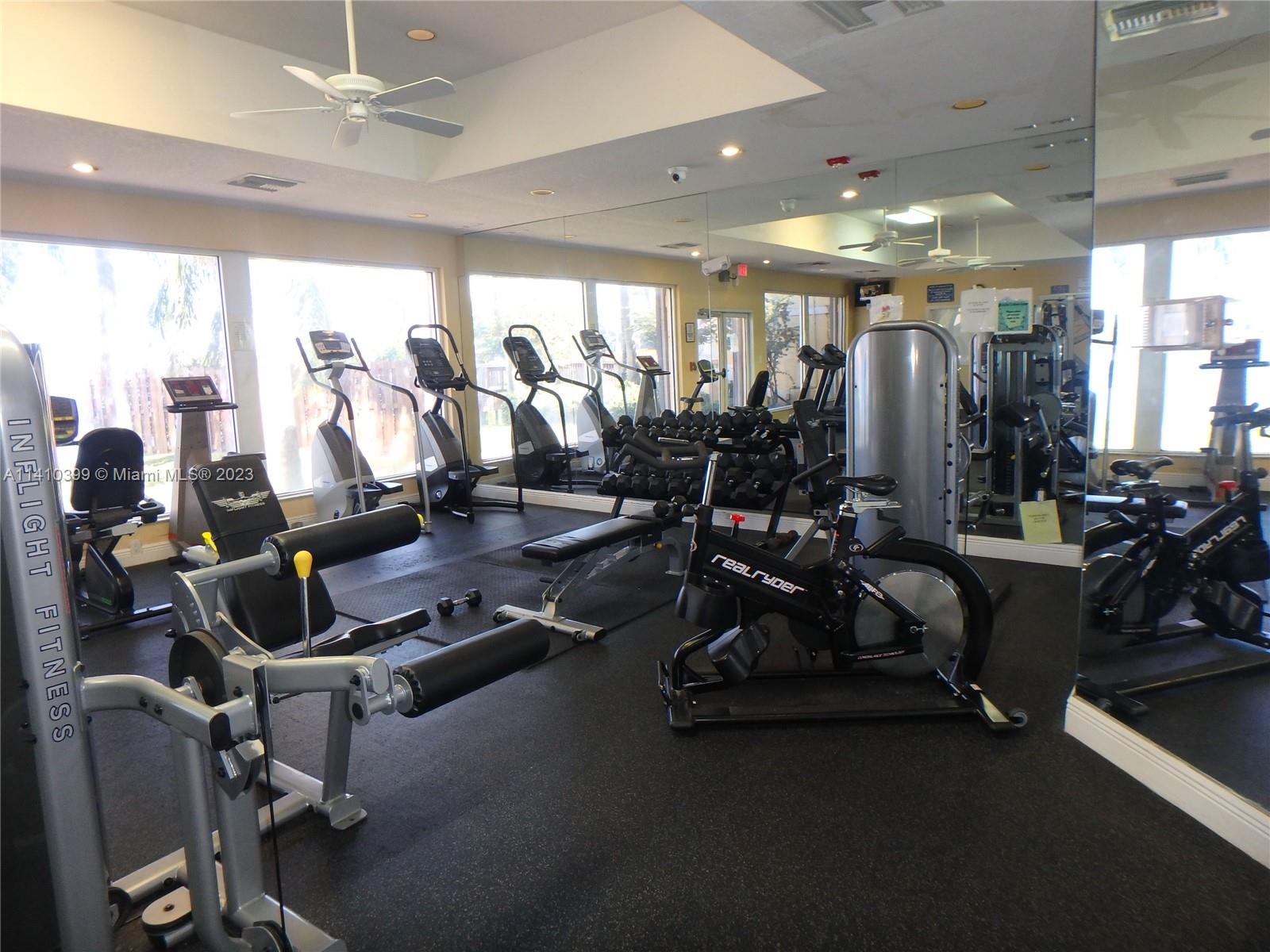 12030 Southwest 135th Terrace Miami, FL 33186 - Photo 23 of 27 a view of a room with gym equipment