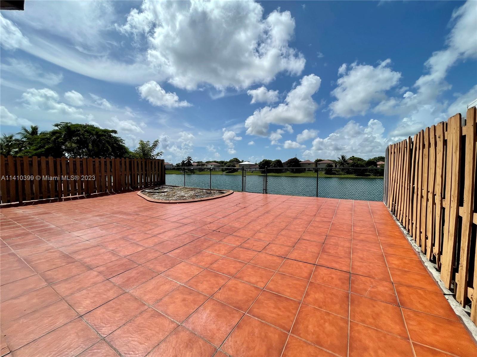 12030 Southwest 135th Terrace Miami, FL 33186 - Photo 4 of 27 a terrace with sky view