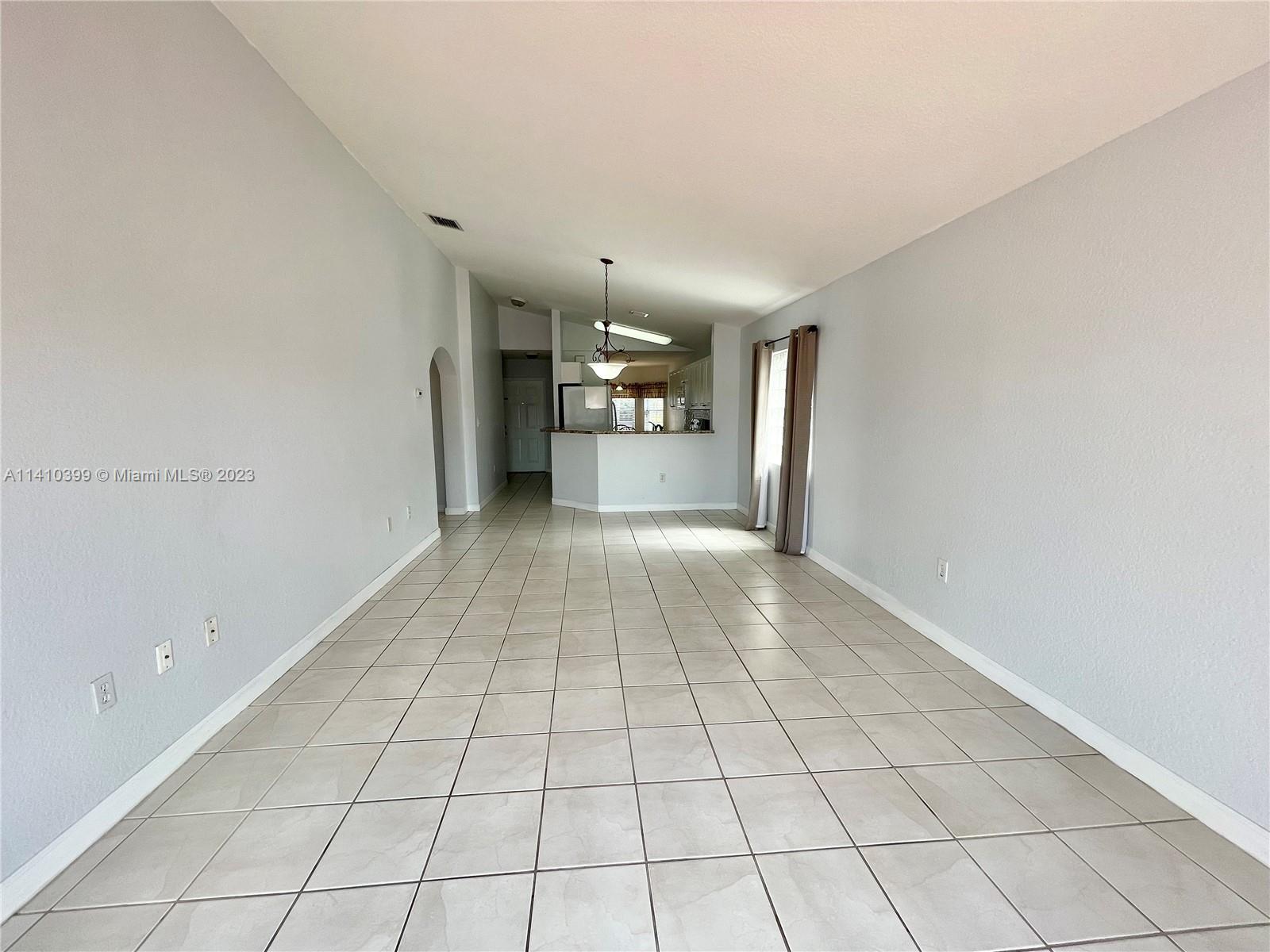 12030 Southwest 135th Terrace Miami, FL 33186 - Photo 9 of 27 a view of a hallway