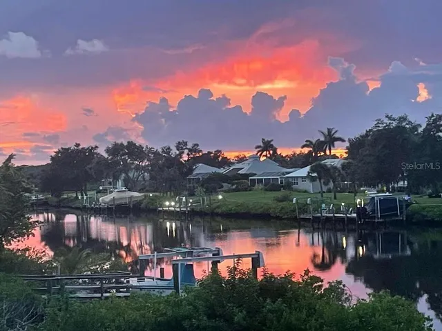 a view of lake with green space