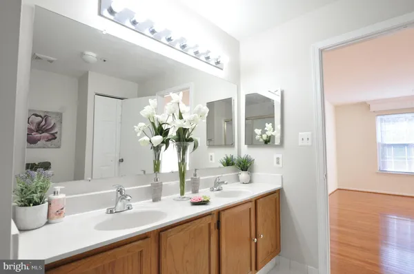 a bathroom with a toilet a sink and a shower