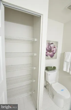 a kitchen with refrigerator and window
