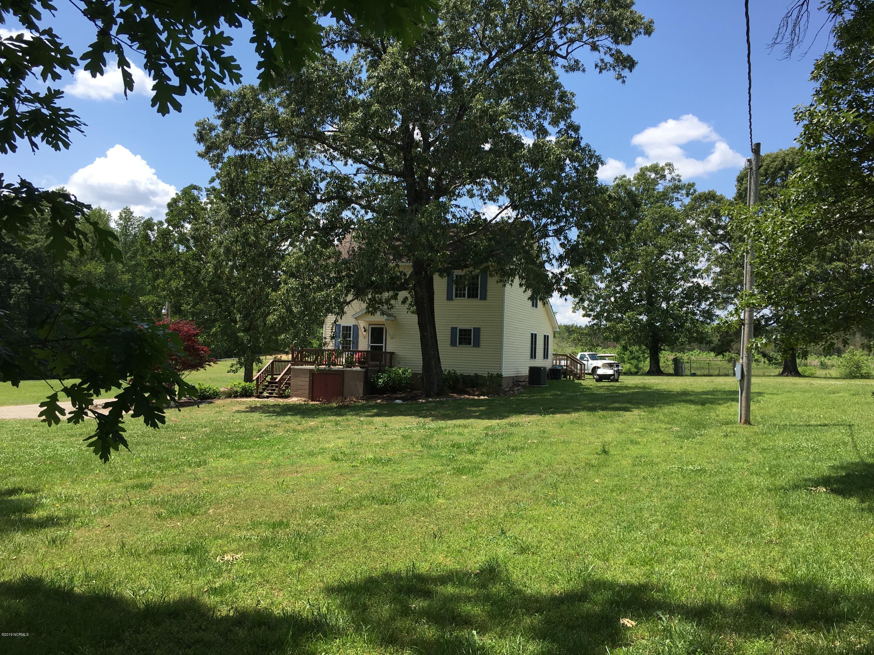 4958 St Rose Church Road Sims, NC 27880 - Photo 2 of 22 Large front yard with mature trees.